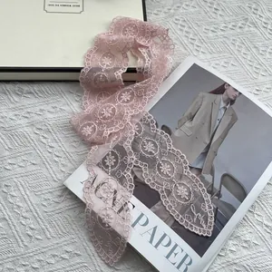 Pink floral lace skinny scarf featuring delicate embroidery and elegant wavy edges