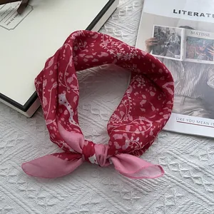 Red paisley cotton bandana for women with vintage floral pattern and elegant knotted style