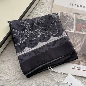 Retro paisley square bandana in black and grey cotton with stylish vintage floral pattern