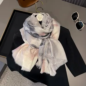 Artistic ink-wash cotton linen scarf with soft fringe and gold-toned floral accents