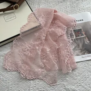 Elegant light pink lace scarf with pearl embroidery and delicate mesh texture