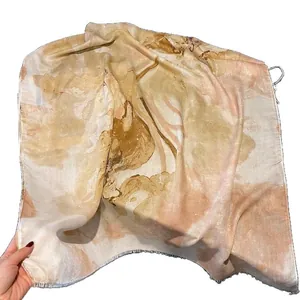 Lightweight cotton linen shawl with abstract marble print and rustic raw edges