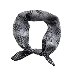 Plaid square scarf for women featuring black and white heart patterns and soft texture