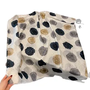 Beige cotton linen scarf for women featuring navy blue and gold metallic polka dots