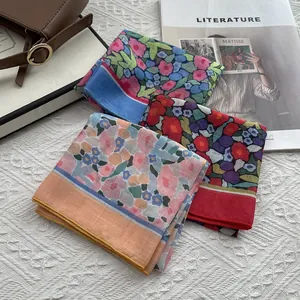 Floral cotton linen square scarves in orange, blue, and red with vintage flower patterns