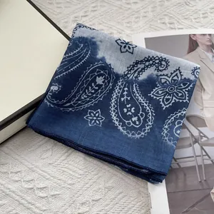 Navy blue paisley linen cotton neckerchief with gradient tie-dye pattern on white background