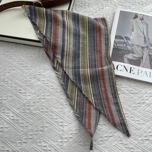 Japanese style colorful striped cotton neckerchief on a white waffle texture background
