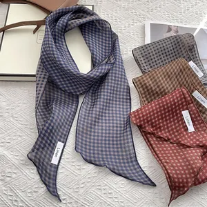 French style plaid skinny linen scarf in caramel and blue tones on white fabric