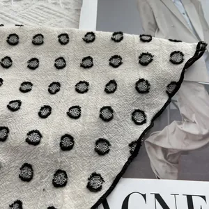 Minimalist cotton linen polka dot scarf with black embroidered dots and stitched edges
