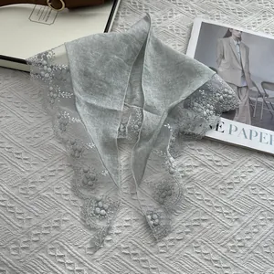Light gray triangle scarf with white lace floral embroidery and premium cotton texture