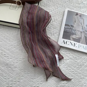 Japanese style colorful striped ramie linen scarf displayed with fashion accessories