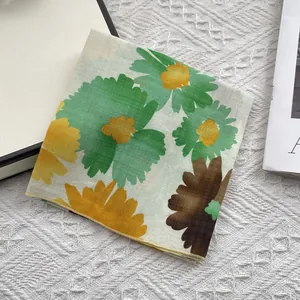 Detailed close-up of floral print cotton linen square scarf with fine edge stitching