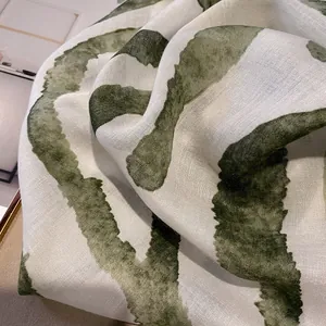 Lightweight cotton linen scarf with green abstract stripes for sun protection and beach wear