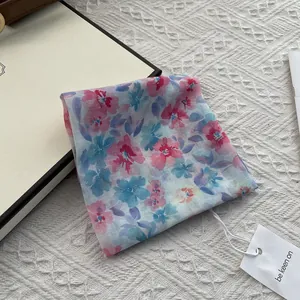Detail of floral cotton linen square scarf with watercolor print and elegant gift box