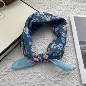 Blue floral silk square scarf with colorful daisy pattern for hair and neck styling
