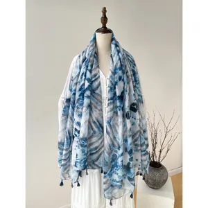 Artistic blue and grey tie-dye cotton scarf with elegant fringe tassels for women