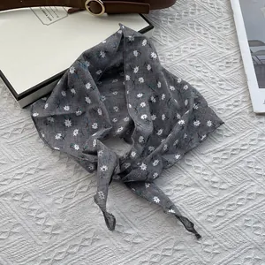 Floral cotton linen triangle scarf with grey vintage patterns on a white background