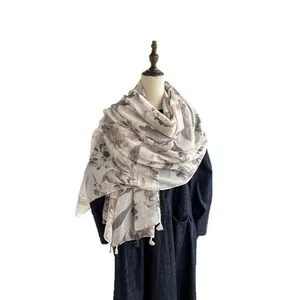 Elegant Chinese style linen shawl with grey floral patterns and tassel edges on mannequin