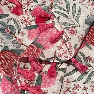 Linen cotton scarf with floral protea prints and pink fringe tassels for summer sun protection