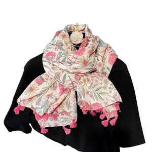 Floral cotton linen scarf with pink tassels and a camellia brooch for women in spring