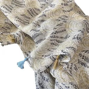 Bohemian style linen feel scarf with geometric circle prints and decorative tassels