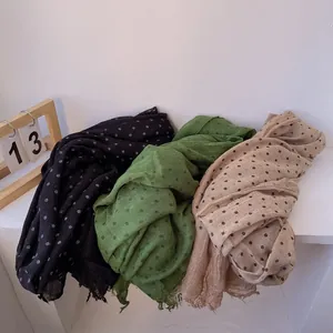 Lightweight linen polka dot scarves in black, green and beige with fringe details