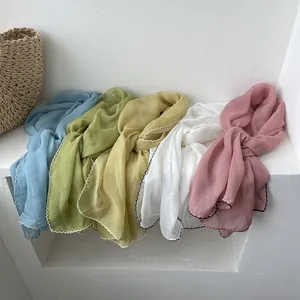Lightweight sheer chiffon sun-protection scarves in multiple colors with wavy edges