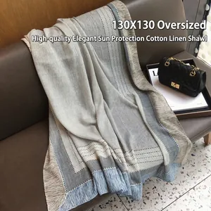 Plaid and polka dot cotton linen sun shawl measuring 130x130cm with tassel edges