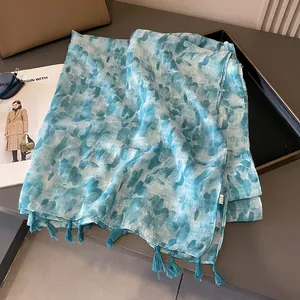 Ethnic style blue and white linen shawl with fringe for desert travel photography