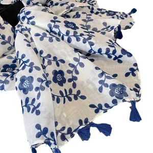 Blue and white floral porcelain style scarf with elegant navy blue tassel details