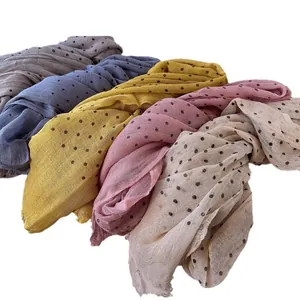 Polka dot linen scarf set in grey, blue, yellow, pink, and beige with natural frayed edges