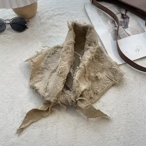 Beige cotton linen bandana scarf with frayed edges styled with vintage accessories