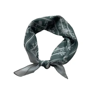 Breathable cotton linen scarf with dark green floral prints and knot styling