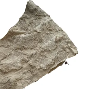 Beige cotton linen triangular scarf with vintage frayed edges and distressed texture