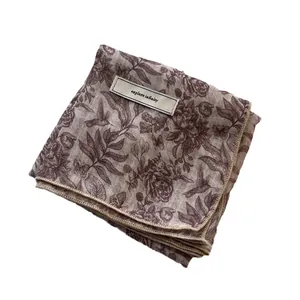 Floral print cotton linen scarf in vintage brown with explore infinity label detail