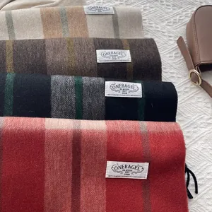 Classic plaid cashmere scarves with tassels in green, red, and brown colors