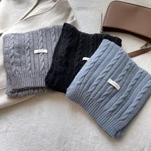 Classic cable knit wool blend scarf for women in gray, black, and light blue colors