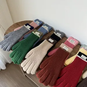Warm touch screen knitted gloves in multiple colors with ribbed cuffs and contrast stripes
