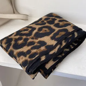 Thick leopard print knitted shawl scarf with ribbed texture for winter fashion styles