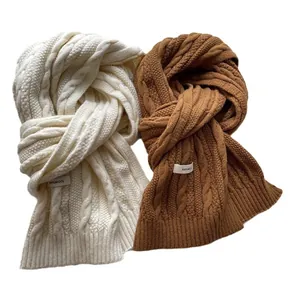 Thick cable knit 100% wool scarves in beige and caramel colors with soft texture