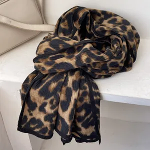 Thick leopard print knit scarf for women with vintage aesthetic and soft vertical ribbed texture