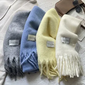 Winter Iceland sea salt blue wool scarf with long tassels in a variety of soft colors