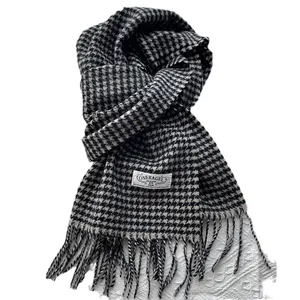 Classic black and white houndstooth wool scarf with fringe and white brand label