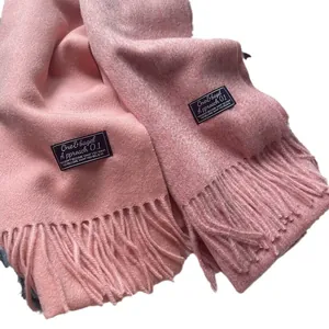 Minimalist 100% pure wool scarf with tassel fringe and pink woven chic label