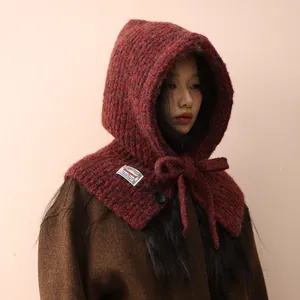 Winter chunky knit balaclava hood in reddish brown with adjustable chin straps