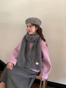 Gray plush scarf and beret set styled with a pink wool coat for a cozy winter look