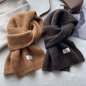 Thick wool blend knit scarves in mustard yellow and dark coffee brown for winter