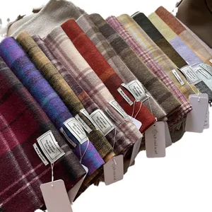 Cozy 100% wool scarves in various vintage plaid patterns and colors for winter