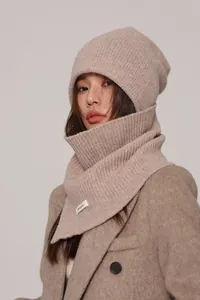 Detail of oatmeal ribbed knit beanie and neck warmer set made of 100% pure wool