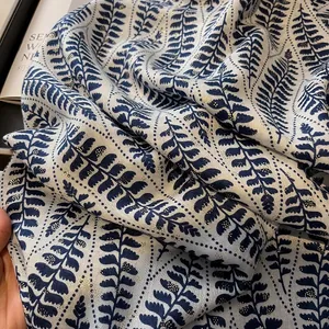Ethnic cotton linen scarf with blue fern leaves and gold shimmer for women